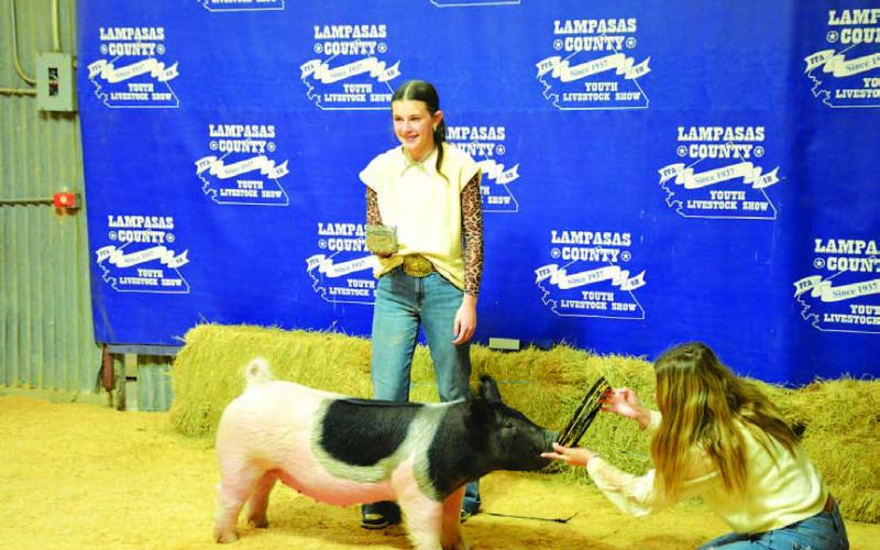 Hayden Ferguson captured Intermediate Showmanship honors for market swine. HUNTER KING | DISPATCH RECORD