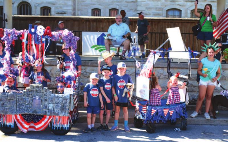 Theme winners for the Pet Parade were announced: first place, Marlee, Chett and Ky with Dixie, Harvey and June; second, a float titled “Let Cousins Spring”; and third, Brodie with dog Avery. They are pictured here left to right. MASON HINES | DISPATCH RECORD