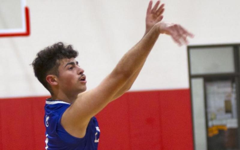 Anthony Ortiz makes one of his two three-pointers in the third quarter. JEFF LOWE | DISPATCH RECORD