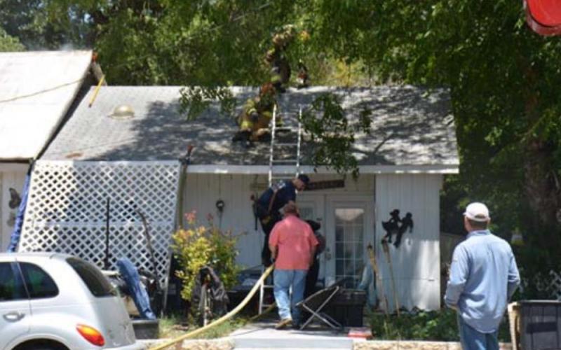 Several agencies responded to a fire on Main Street Tuesday. MONIQUE BRAND | DISPATCH RECORD