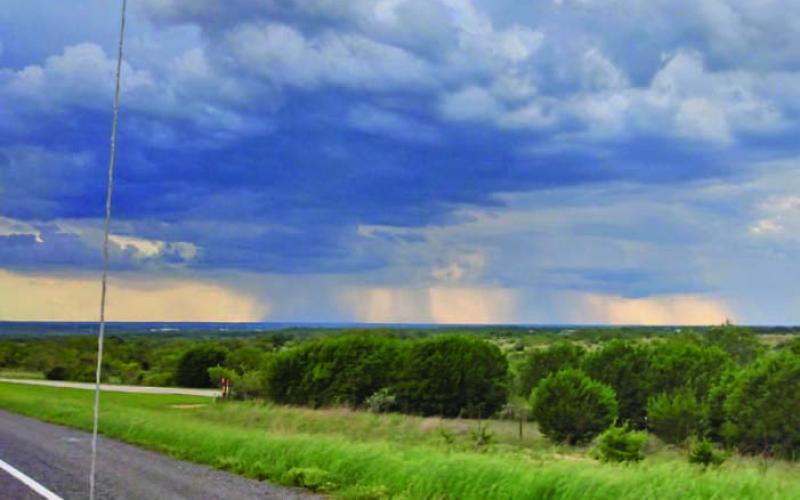 COURTESY PHOTO These rain clouds were observed off FM 580 East earlier in the fall. Precious little moisture was recorded over the first eight months of the year, when Lampasas County was considered in severe drought conditions.