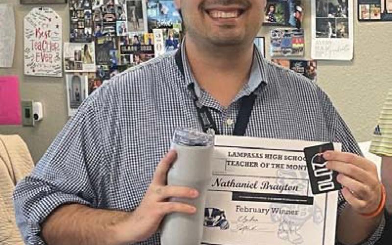 Nathaniel Brayton, an English IV instructor, was named Teacher of the Month for February at Lampasas High School. Farm Bureau Insurance provided a mug and gift card for the teacher. Assistant Principal Ryan Race said of Brayton: “He does an amazing job building relationships with his seniors to promote high-level thinking.” COURTES Y PHOTO
