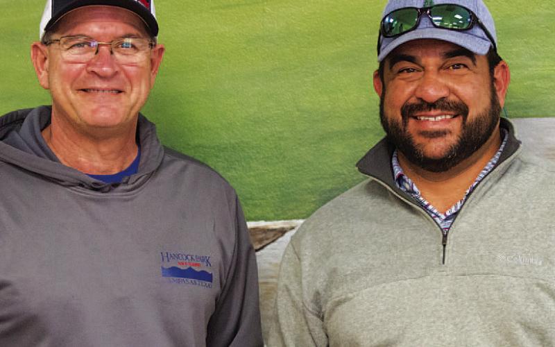HUNTER KING | DISPATCH RECORD Van Berry, left, poses with new golf course manager Kris Morin as he takes over the position.