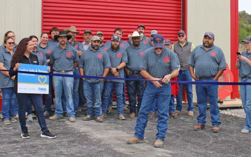 Lometa Volunteer Fire Department Chief Bobby Odom cuts the ribbon to signify the opening of the new fire station on Sunday. Mason hines | Dispatch Record