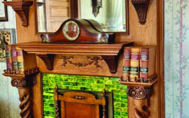 The Gillen House boasts three lovely fireplaces, two of which are framed by Italian marble such as this. Each fireplace is adorned with intricately carved wooden mantles that are original to the house. JOYCESARAH MCCABE | DISPATCH RECORD