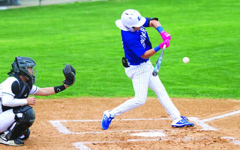Anthony Dimas delivered with a double in the district home opener. HUNTER KING | DISPATCH RECORD