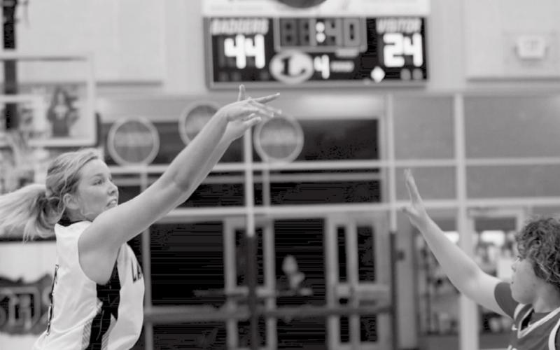 Laurcy Bender shoots a three-pointer in a home game Tuesday against Lake Belton. JEFF LOWE | DISPATCH RECORD