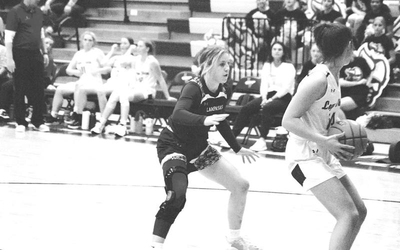 Aspen Wheeler plays full-court defense on the Lago Vista ball handler. HUNTER KING | DISPATCH RECORD