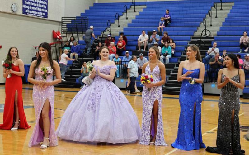 The nominees for LHS Prom Queen, Arielle Aguirre, Jamie Ball, Morgan Bobo, Keely Cavel and Kenzie Roberts, cheer for this year’s winner, Liliana Miller. JOYCESARAH MCCABE | DISPATCH RECORD