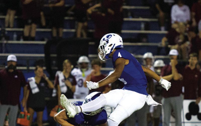 Josiah Toeaina kicks a field goal during last week’s game. HUNTER KING | DISPATCH RECORD