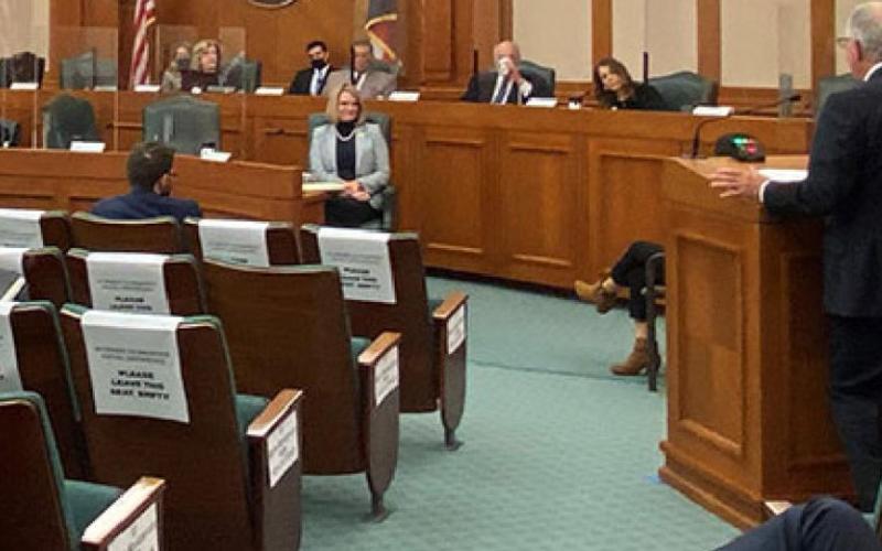 Mickey Edwards spoke before the Texas Senate Finance Committee earlier this month, recommending removal of a rider that prevents warfarin from being used to control feral hogs. COURTESY PHOTO