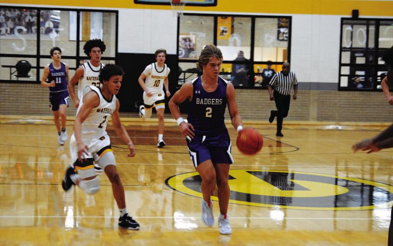 HUNTER KING | DISPATCH RECORD Hagen Oncken drives to the basket for a finish against the Gatesville Hornets on Tuesday afternoon.