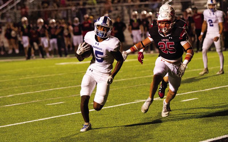 Wesley Stephens races to the corner of the end zone against Lorena. HUNTER KING | DISPATCH RECORD