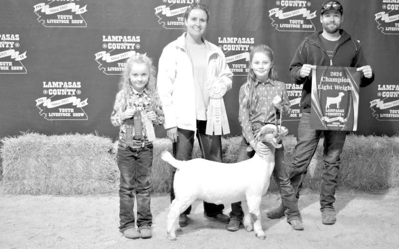 ERICK MITCHELL | DISPATCH RECORD McKaylynn McKinnon showed the reserve champion breeding goat. Her entry was in the lightweight classification.