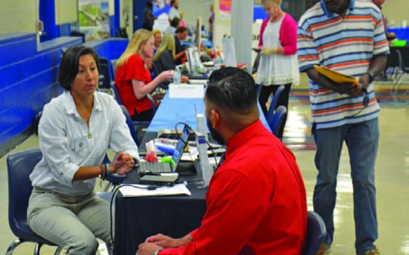 Employers will be set up at the Calvert Municipal Building on Wednesday to visit with job seekers and to answer questions about openings within their industries. FILE PHOTO