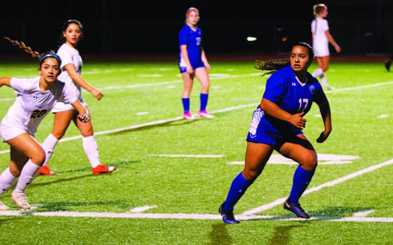 Arianna Bermudez breaks open to receive the ball from a throw in during the second half. HUNTER KING | DISPATCH RECORD