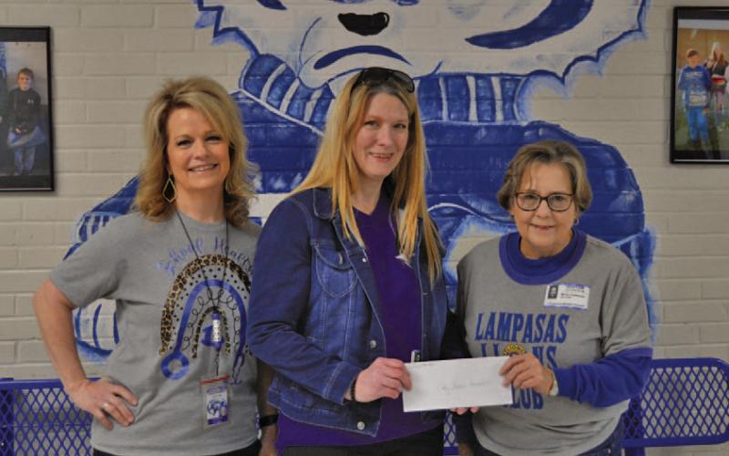 ERICK MITCHELL | DISPATCH RECORD Left to right are LISD Director of School Health Services Donna Clark, Cody Stephens Foundation Heart Screening Director Debbie Doncer and Lampasas Lions Club member Molly Patteson. The Lions Club donated $1,000 for electrocardiogram tests for Lampasas students.