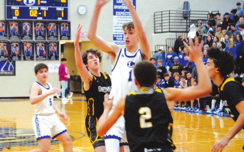Kaeden Crawford looks for a teammate to pass to after catching the ball in the paint against Gatesville on Tuesday. HUNTER KING | DISPATCH RECORD