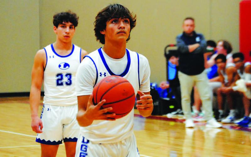 AJ Rosales is getting his first shot at varsity basketball this season, and so far he is taking advantage and playing well. HUNTER KING | DISPATCH RECORD