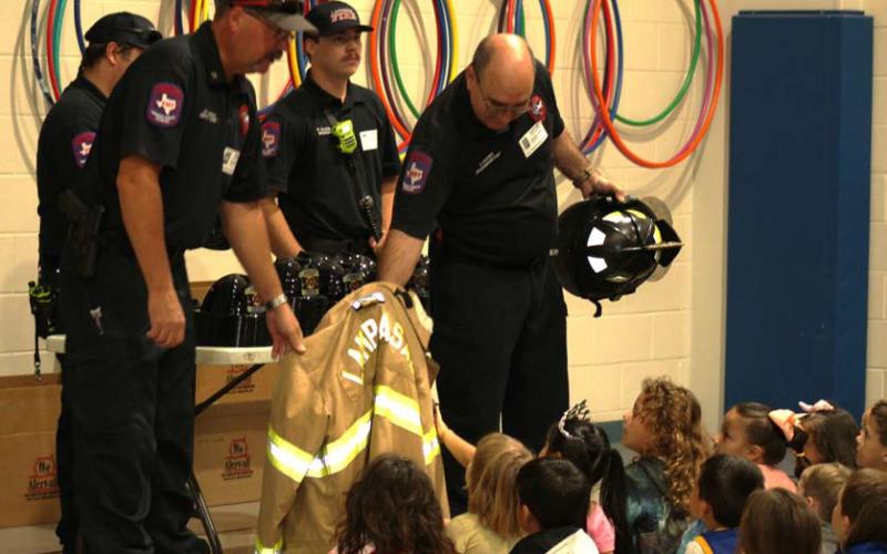 Lampasas firemen talk to Hanna Springs Elementary School students concerning fire safety in and around the home and what to do if a fire breaks out. JOYCESARAH MCCABE | DISPATCH RECORD