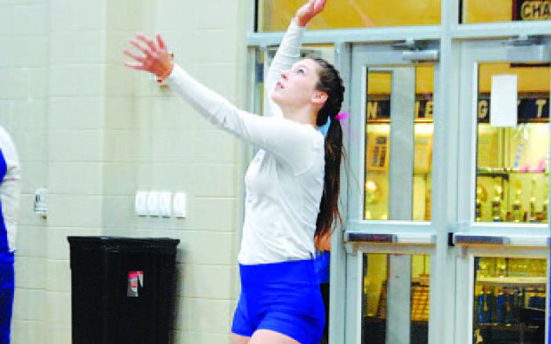 Emily Cain serves during the second set of Tuesday’s match. She is one of many seniors for the Lady Badgers. HUNTER KING | DISPATCH RECORD