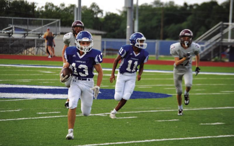 HUNTER KING | DISPATCH RECORD Tate Langford (13) and Jaden McElwain (11) look to continue the freshman team’s winning ways.