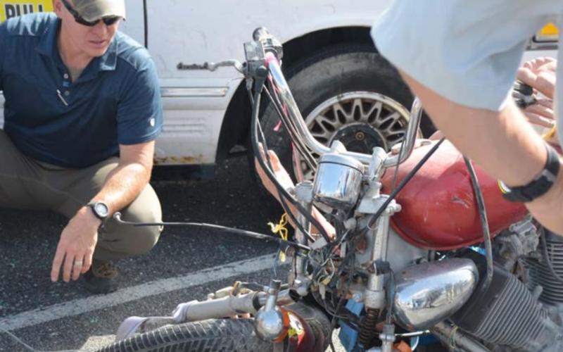Boerne Highway Patrolman Robert Laferney investigates a simulated crash scene at a recent safety training event in Lampasas. MASON HINES | DISPATCH RECORD