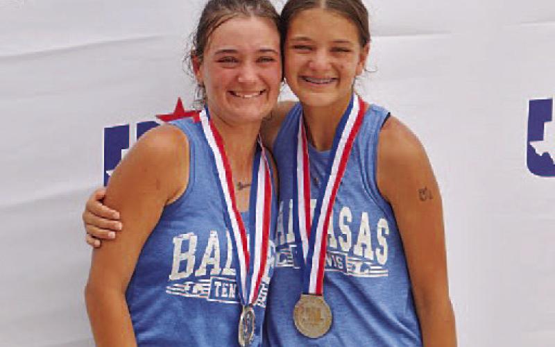 Caroline White, left, and Madelynn White were the second-best 4A girls’ doubles team in the state in the spring 2026 season. COURTESY PHOTO | KENNETH PEISER