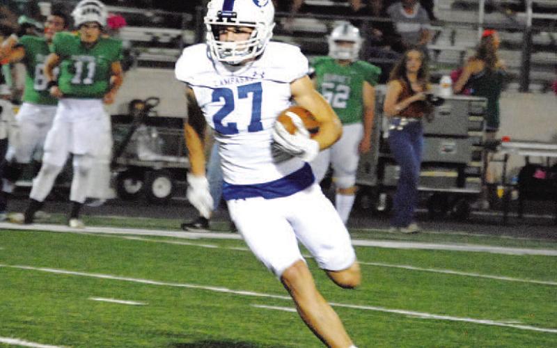 HUNTER KING | DISPATCH RECORD Jett Walker played his second varsity game and scored his first touchdown against Burnet.
