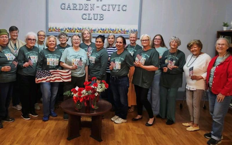 L-M Garden and Civic Club members pose for a group photo at their February gathering. COURTESY PHOTO