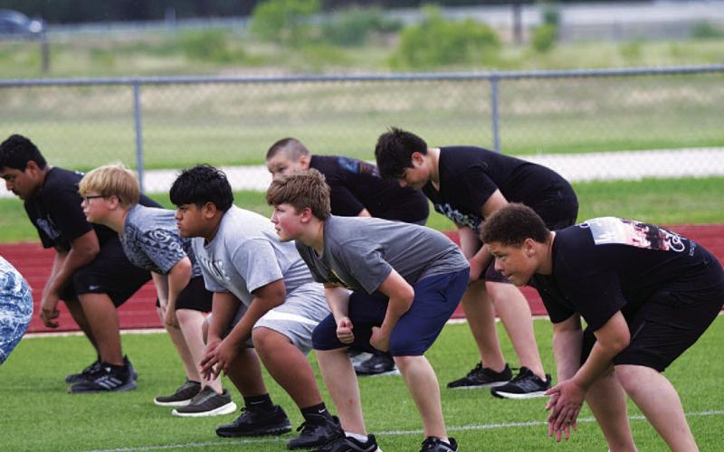Young linemen practice during sport-specific drills. HUNTER KING | DISPATCH RECORD