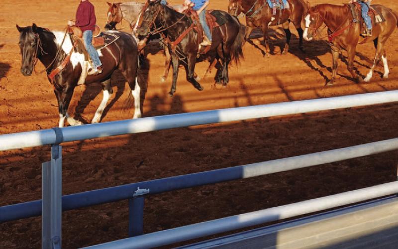 Youth riders prepare their horses before the start of the rodeo. Lampasas Junior Rodeo offered barrels, flags, rough stock, goats, poles and roping competition for youth in several age divisions. COURTESY PHOTO