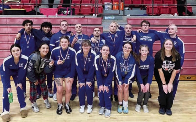 Lampasas wrestlers pose with their medals from Wednesday. COURTESY PHOTO | LAMPASAS ISD ATHLETICS FACEBOOK