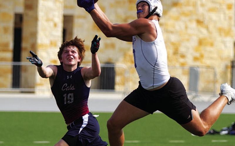 HUNTER KING | DISPATCH RECORD Haegan Oncken hauls in an interception as he played both sides during 7-on-7.