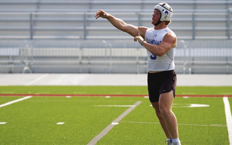HUNTER KING | DISPATCH RECORD Reed Jerome throws a pass toward the end zone late in 7-on-7 action on Tuesday.