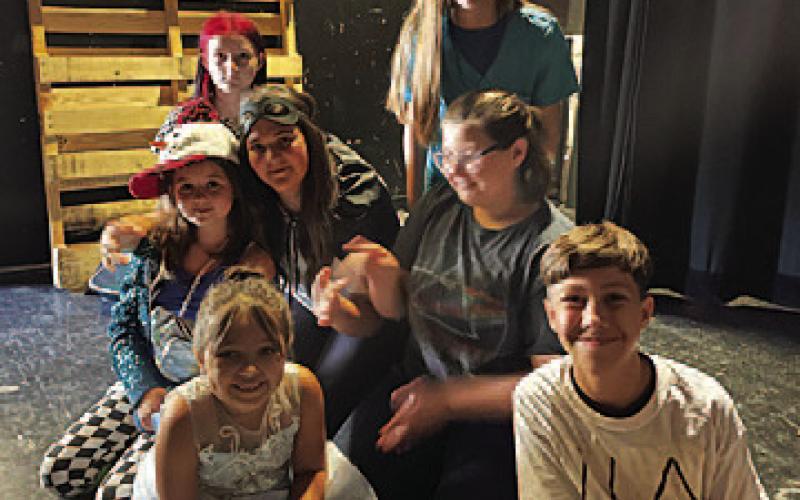 JEN WISIAN | COURTESY PHOTO The ensemble “cameo” cast for the production of “Superhero Sanitarium” consisted of some youth who attended the Lometa Community Theater’s summer camp. Front row from left are Sophia Constancio and Derek Butler; middle row, Emilia Trowbridge, Quinne Garcia and Nicole Walton; and back row, Jennamarie Thomas and Cheyenne Butler.