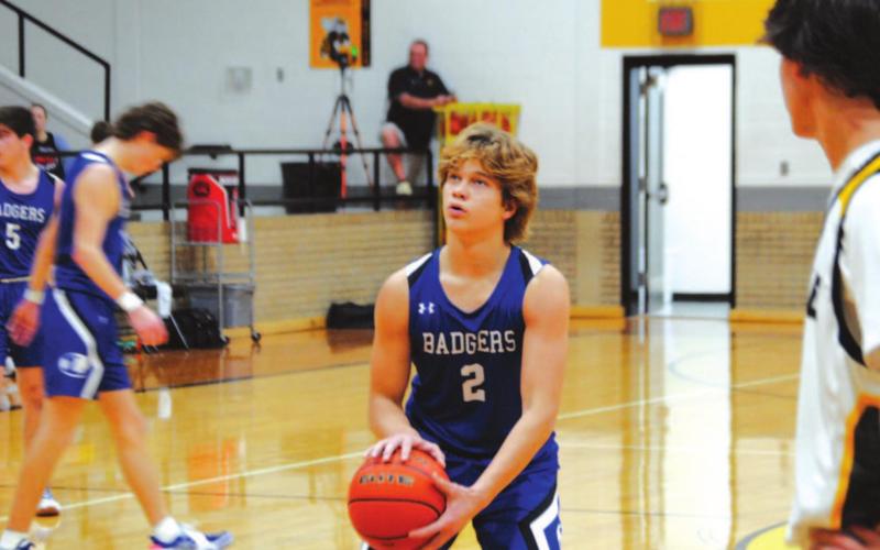 Hagen Oncken prepares to shoot a free throw on his way to tallying nine points for the Badgers. HUNTER KING | DISPATCH RECORD
