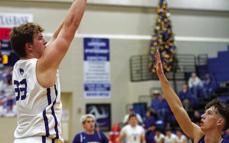 HUNTER KING | DISPATCH RECORD Beau Patterson shoots over a defender during the Badgers’ game against Brock.