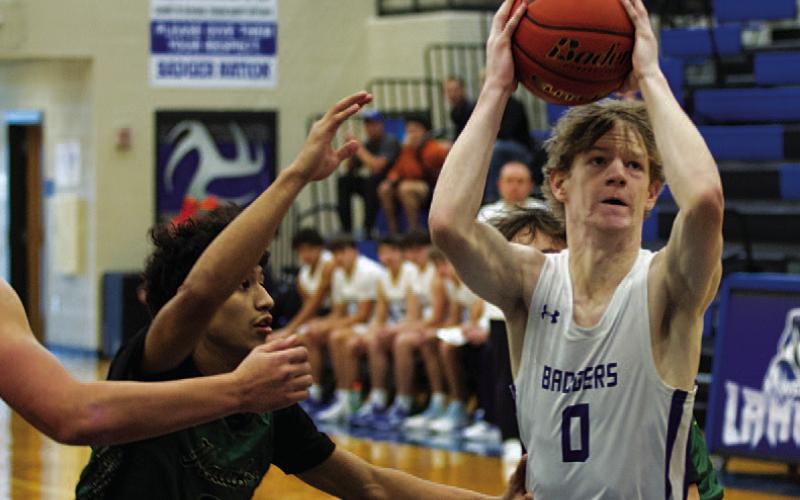 Peyton Sisson cuts through Canyon Lake defenders to score. HUNTER KING | DISPATCH RECORD