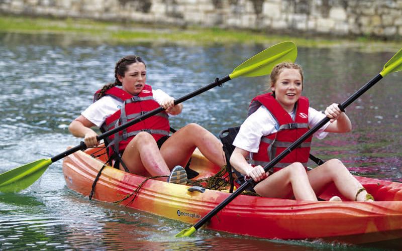 Kayak races feature adult and youth tandem categories, as well as adult singles. ERICK MITCELL | DISPATCH RECORD