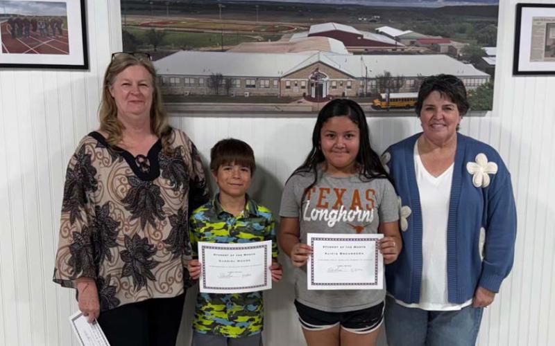 From left, Michelle Spruiell, Gabiel Moore, Alicia Bocanegra, and Michelle Spruiell were recognized at last week’s Lometa ISD Board of Trustees regular meeting. COURTESY PHOTO