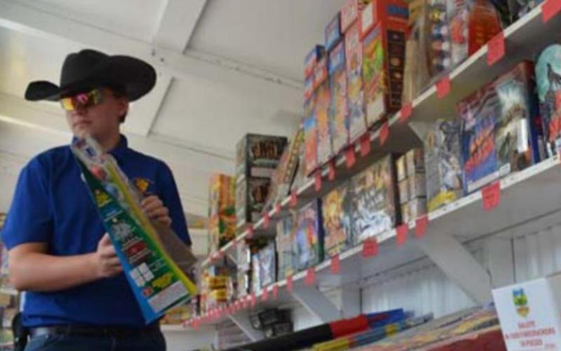 An American Fireworks employee stocks pyrotechnics before holiday sales. FILE PHOTO