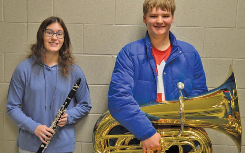Madi Giffin and Alexander Thorne showcase their instruments. The pair are the first Badger Band members to achieve All-State honors in four years. Erick mitchell | dispatch record