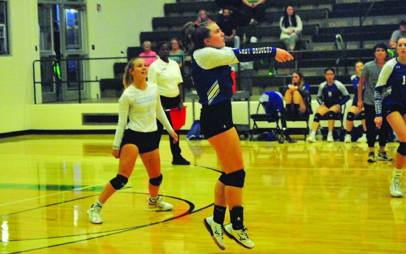 Ava Dowdy makes a pass during the Lady Badgers’ match against Burnet this week. HUNTER KING | DISPATCH RECORD