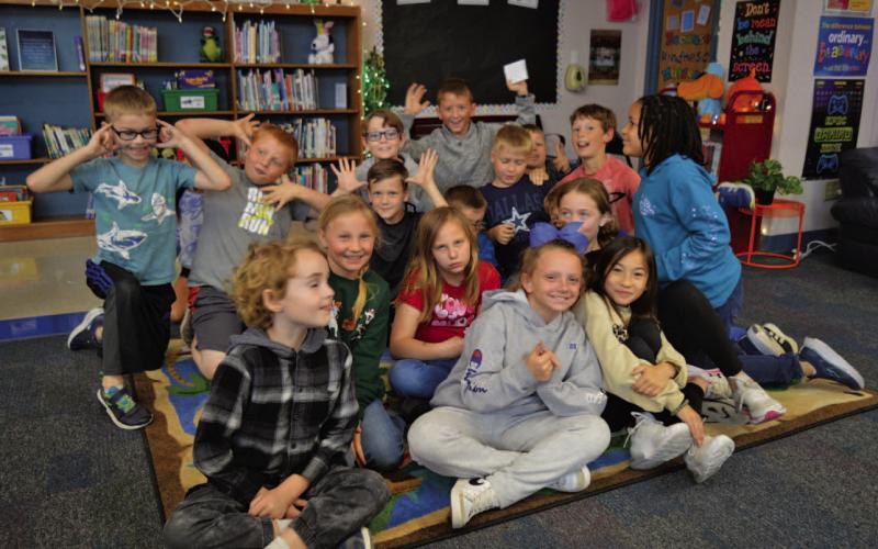 ERICK MITCHELL | DISPATCH RECORD Hanna Springs Elementary School students pose for a photo at the Dispatch Record’s newspaper station, offered as part of Career Exploration Day at the campus.