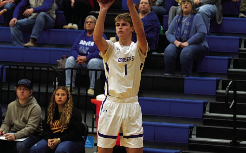 HUNTER KING | DISPATCH RECORD Vincent Shahan shoots a three-point shot during a game earlier this season.