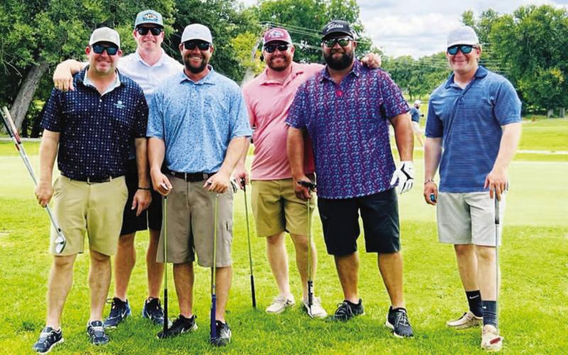 A group from the Jeff Urofsky Memorial Tournament poses for a photo. Winners and results from last week’s scramble event will appear in an upcoming edition of the Dispatch Record. COURTESY PHOTO