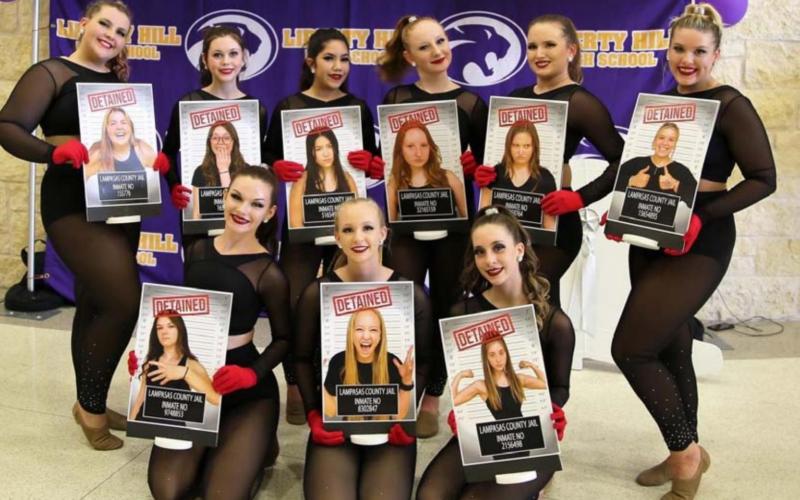 Flames members who performed in their novelty routine at the March 5 Liberty Hill event are, front row from left, April Smith, Kelsey Grimmett and Brooklyn Morris; back row, left to right, Anna Jorstad, Sydney Lesley, Isabell Marks, Madisyn Moreland, Keely Carl and Jaycee Lockhart. COURTESY PHOTO | CHRIS MILES