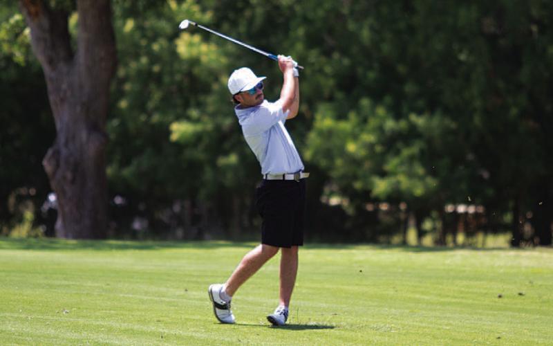 HUNTER KING | DISPATCH RECORD Former Badger Peyton Spore follows through on a shot in his first year playing in the annual event.