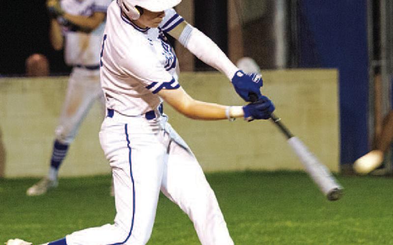 Jonas Andersen hits a single into the outfield. HUNTER KING | DISPATCH RECORD